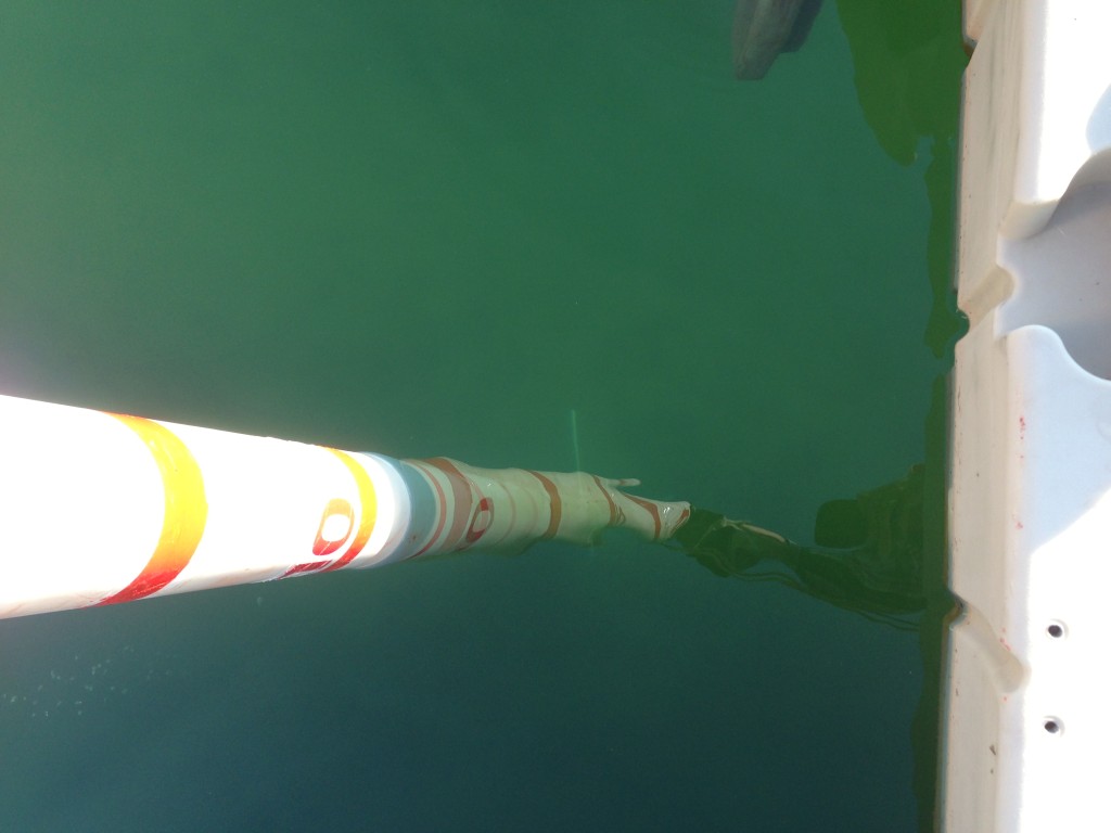 Depth gauge in 10 feet of water & conduit is visible.